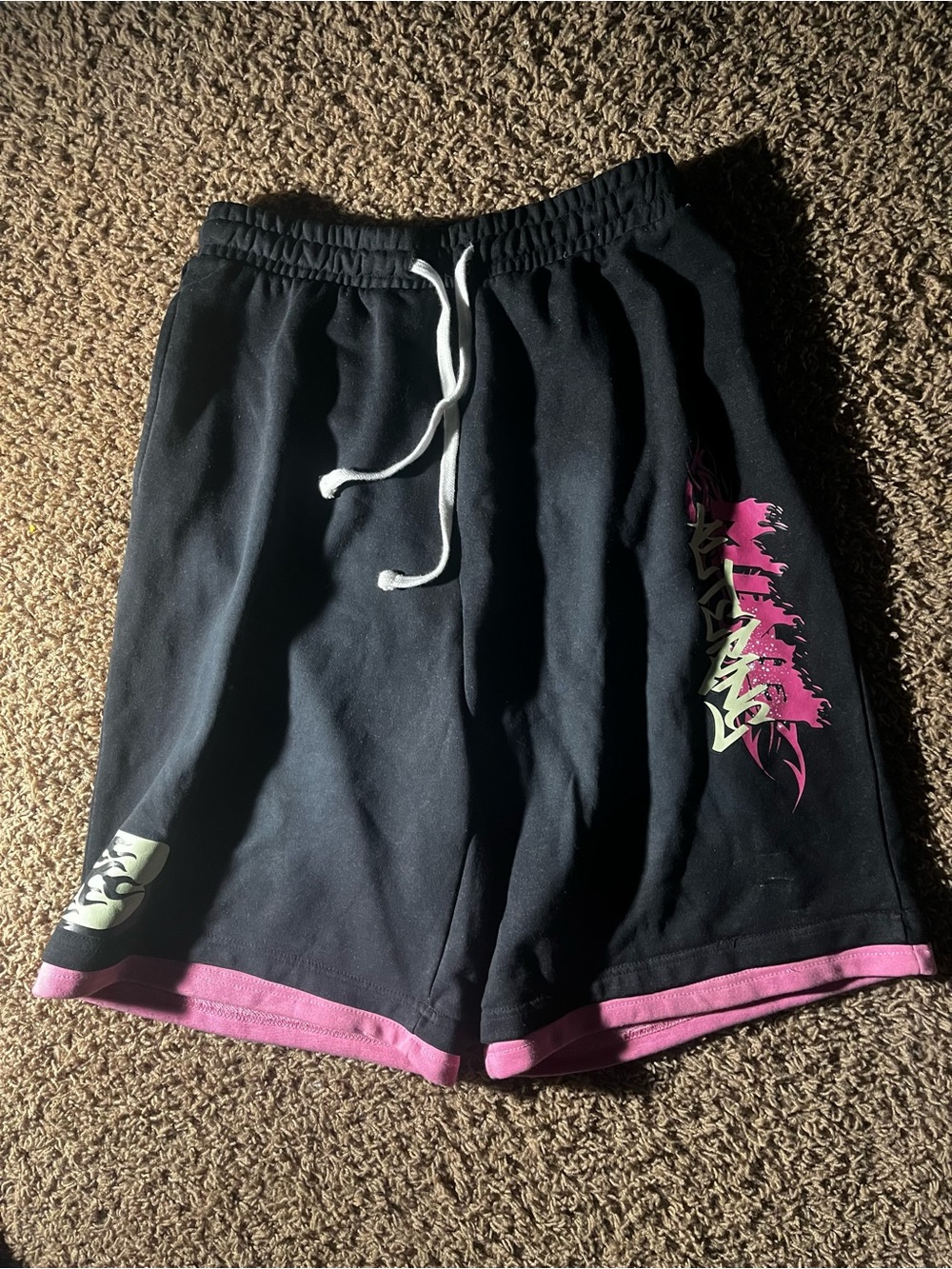Men's Black Athletic Shorts with Pink Trim and Graphic Side